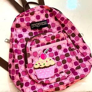 jansport cupcake cutie mini backpack pink and purple tones